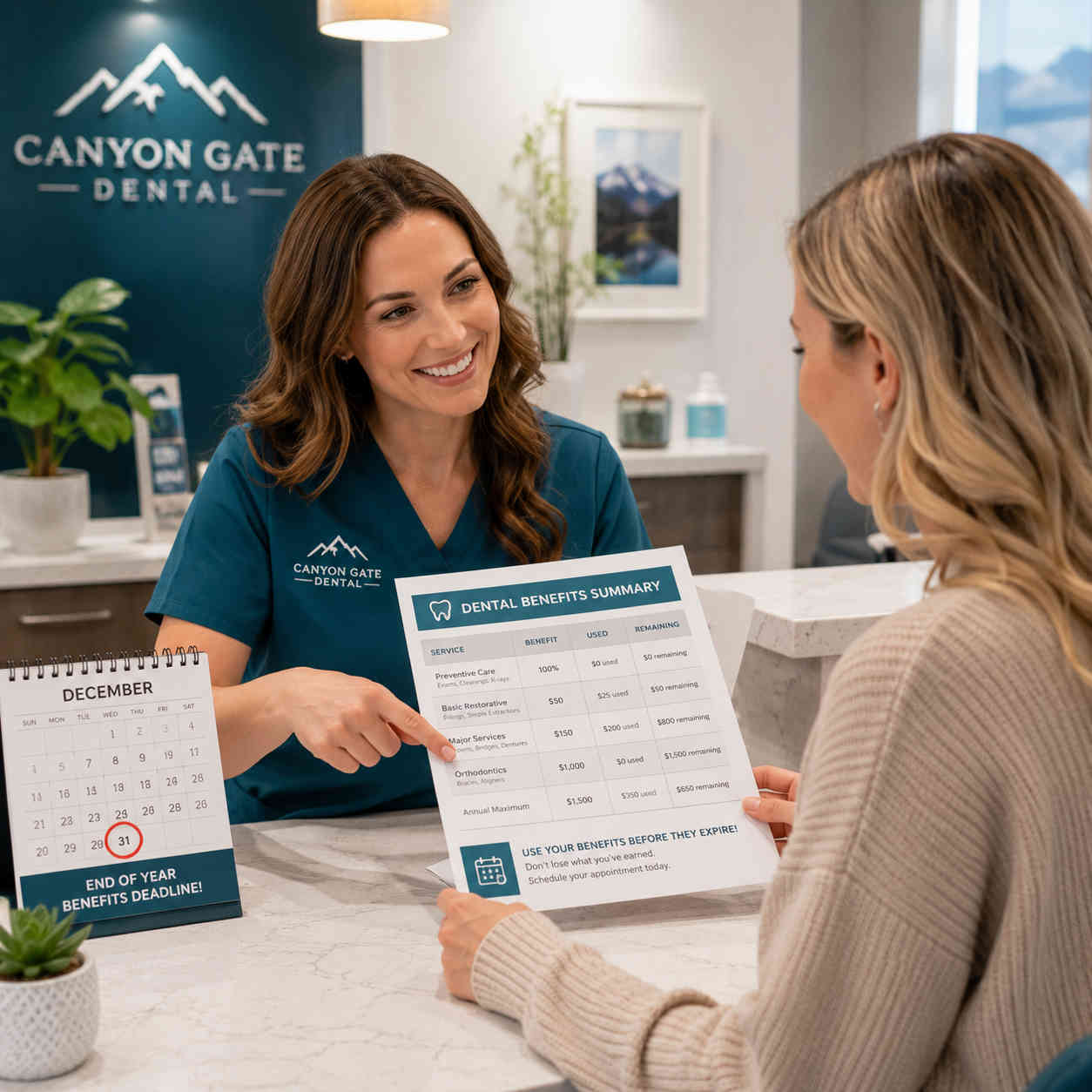 A Canyon Gate Dental patient in Orem Utah reviewing dental insurance benefits with a dental coordinator before year-end appointment scheduling
