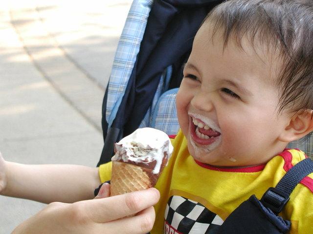 Smiling Baby Eating Icecream