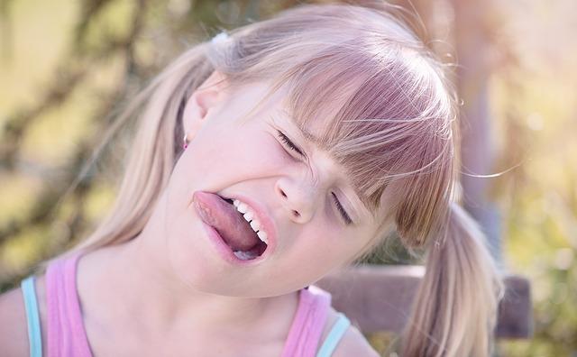 A little girl having Tongue Problems