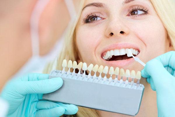 Woman sitting in dentist's chair