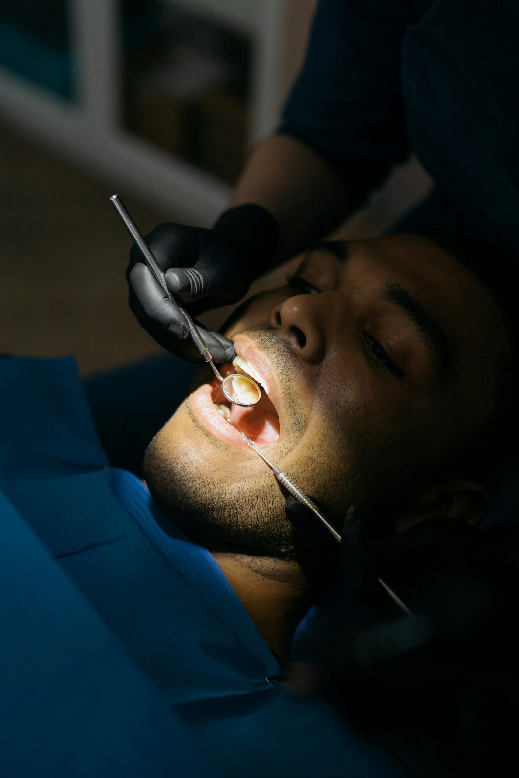 Metal-Free Fillings 1 Patient getting a dental exam