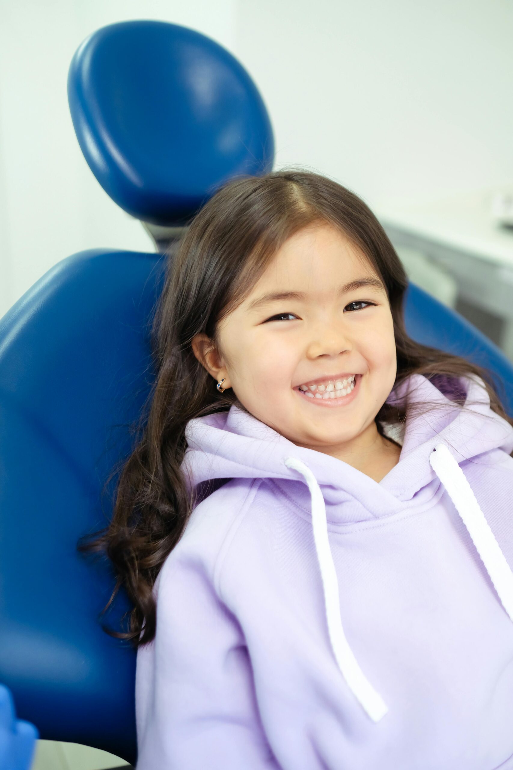 Pediatric Dentistry 2 Smiling Child getting dental exam
