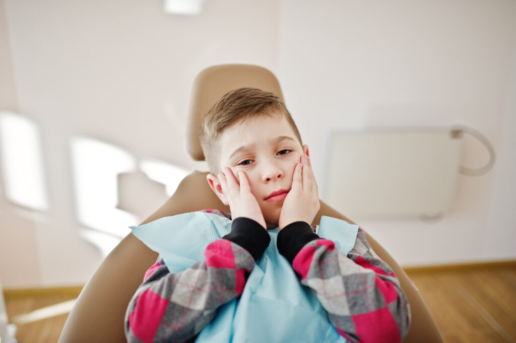 Little boy at dentist chair. Children dental.