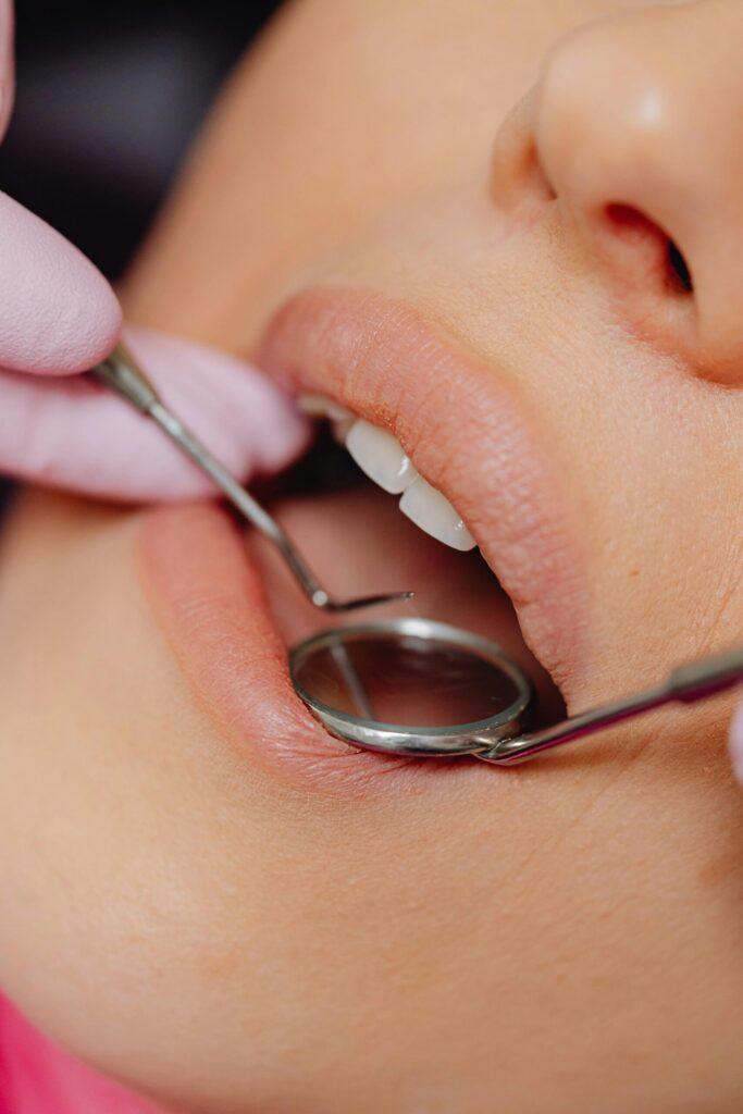 6 Signs It’s Time to Schedule a Dental Cleaning in Orem—Even If Nothing Hurts 1 Dentist examining patient's teeth