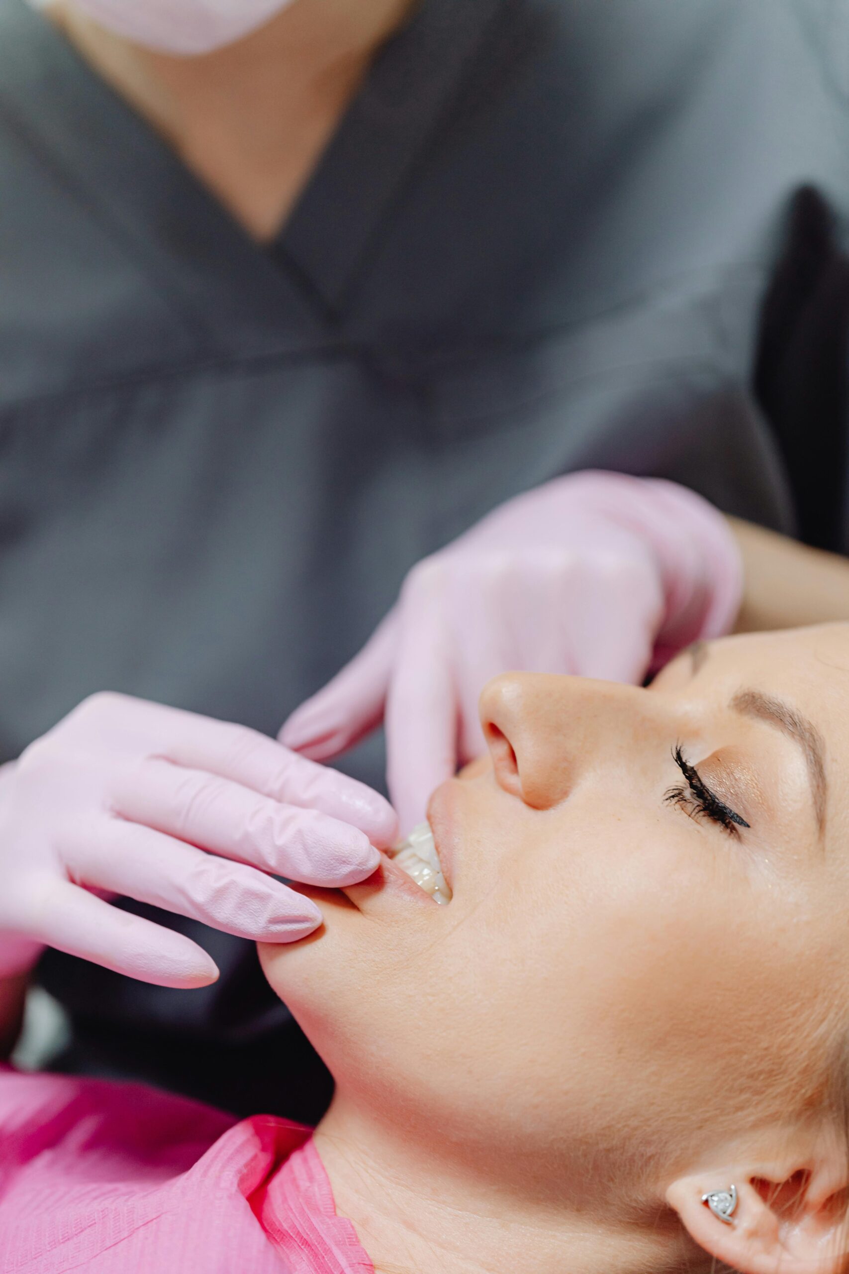 Patient Resources 1 Dentist examining patient's teeth